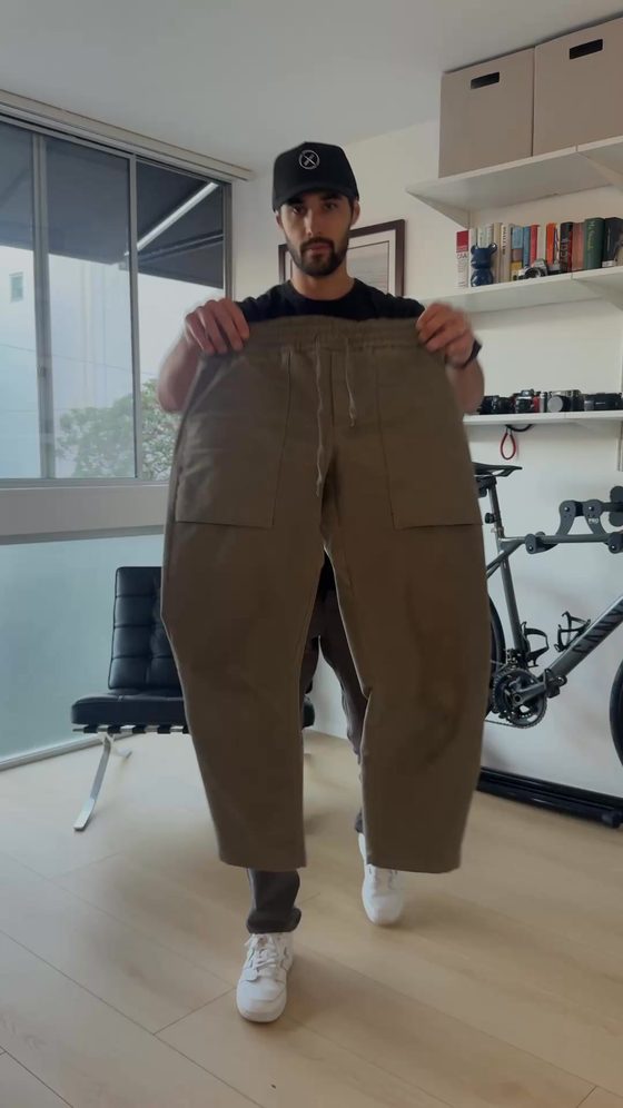 Cuts video ad: a man holding up the Icon Cropped Pant